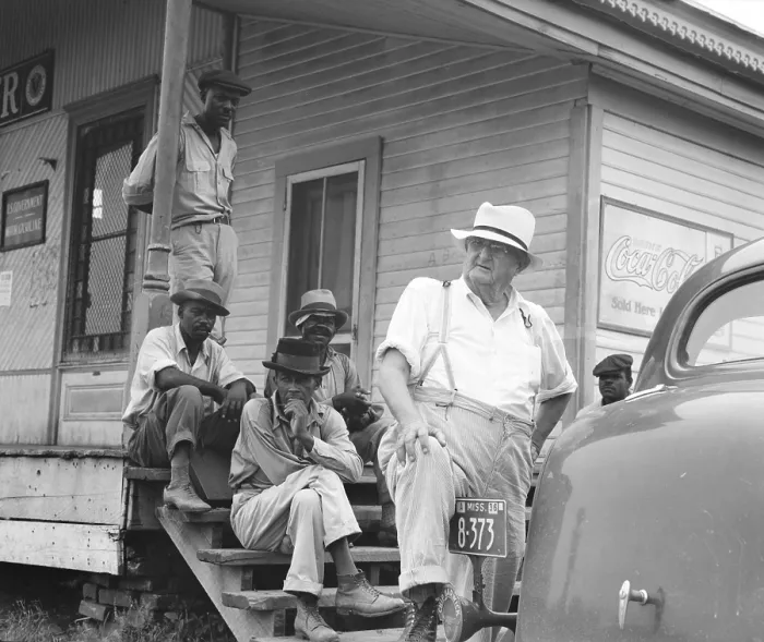 Framed Print : Mississippi Delta planation owner stands with African Americans. June 1936. Photograph by Dorothea Lange. (BSLOC_2013_6_84)