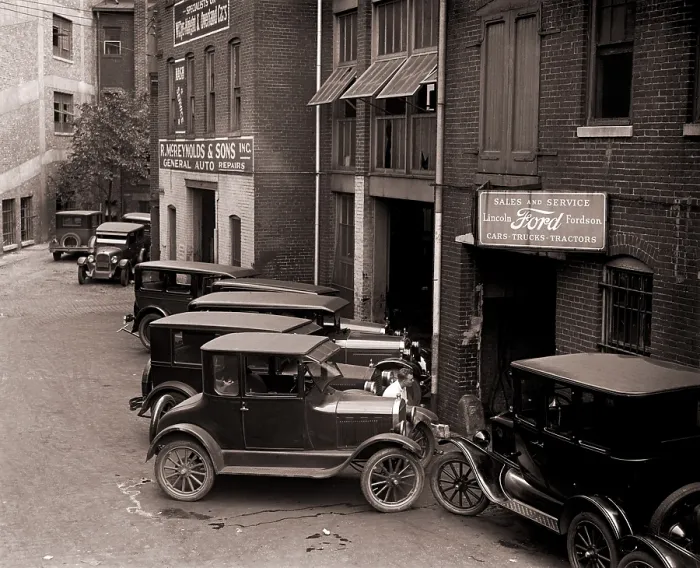 Framed Print : Model Ts, and one more luxurious Lincoln (center front) are parked by a Ford Motor Company dealership in Washington, D.C. in 1926 Framed Print : Model Ts, and one more luxurious Lincoln (center front) are parked by a Ford Motor Company dealership in Washington, D.C. in 1926