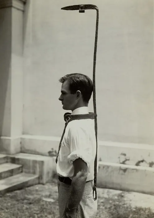 Framed Print : Model wears a slave bell rack, a used slave owners to handicap a runaway slave