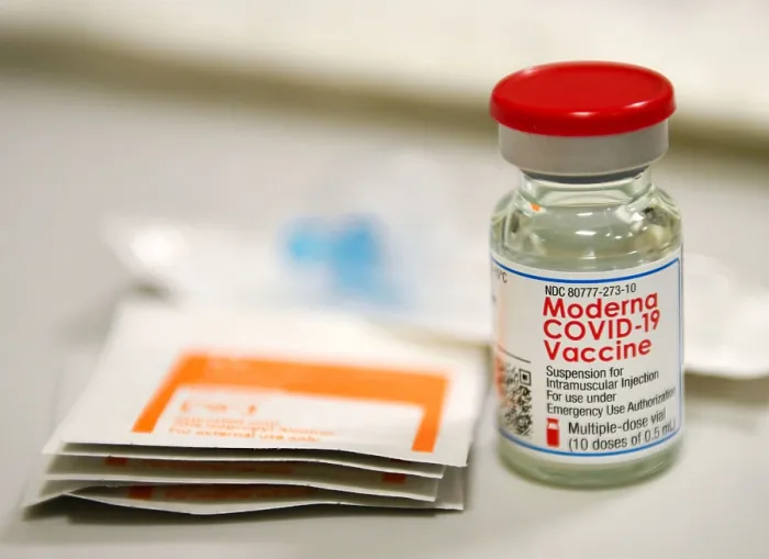 Framed Print : Moderna Covid-19 vaccine vial. The vaccine was authorized for emergency use by the US Food and Drug Administration on Dec. 18, 2020 (BSLOC_2021_1_21) Framed Print : Moderna Covid-19 vaccine vial. The vaccine was authorized for emergency use by the US Food and Drug Administration on Dec. 18, 2020 (BSLOC_2021_1_21)