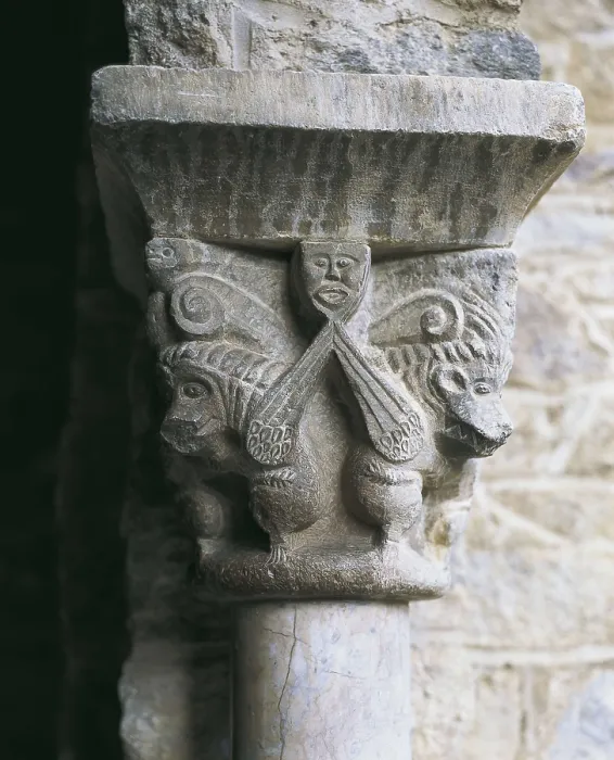 Framed Print : Monastery of Sant Mart del Canig. Cloister. 11th c. - 13th c. FRANCE. Casteil. Abbey of Sant Mart del Canig. Cloister capital with profane scene. Romanesque art. Relief on marble