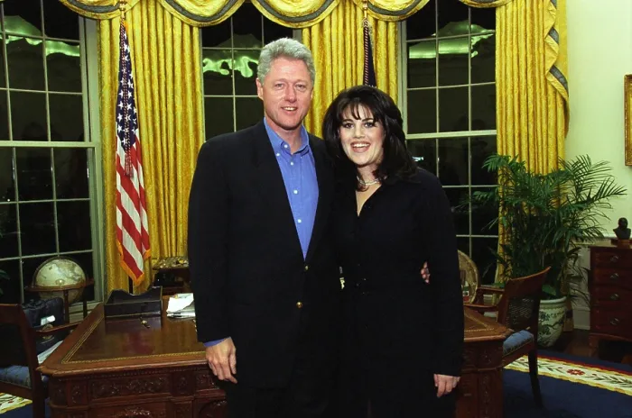 Framed Print : Monica Lewinsky poses with President Bill Clinton in the White House Oval Office. The photo is was taken on February 27, 1997, when she was a guest at his weekly radio address Framed Print : Monica Lewinsky poses with President Bill Clinton in the White House Oval Office. The photo is was taken on February 27, 1997, when she was a guest at his weekly radio address