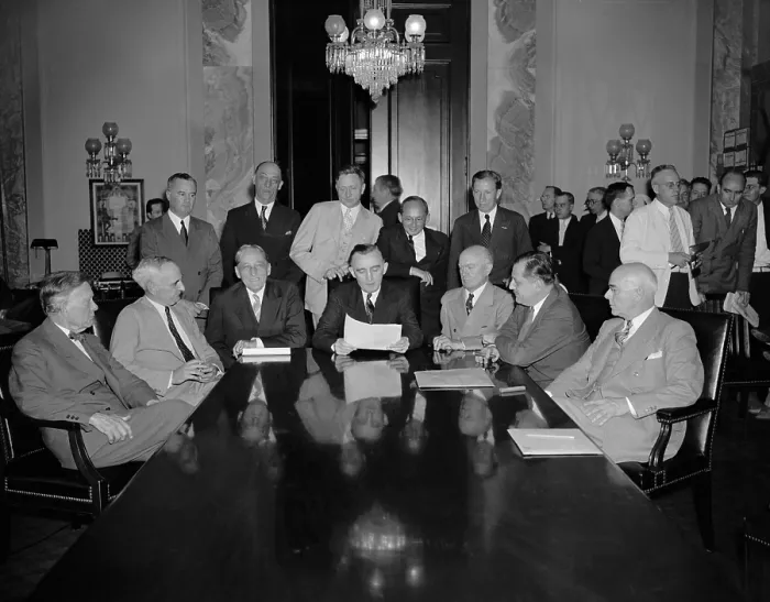 Framed Print : Monopoly Committee opens, July 1, 1938. They were to investigate effect of concentrated wealth and power on business. Sitting, L-R: Sen. William Borah; Herman Oliphant; Sen