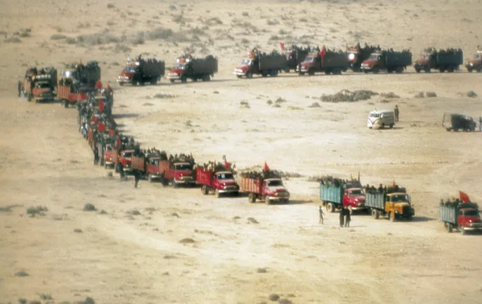 Framed Print : MOROCCO. WESTERN SAHARA. Western Sahara (1975). The Green march. Moroccan lorries in the desert. AISA / Everett Collection (81381)**US SALES ONLY**