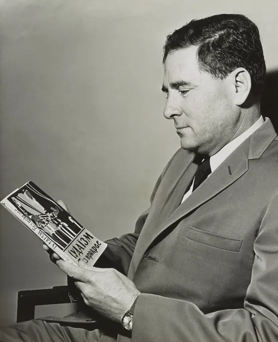 Framed Print : Morris B. Abram, President American Jewish Committee, holding Russian anti-Semitic book. Feb. 28, 1964 Framed Print : Morris B. Abram, President American Jewish Committee, holding Russian anti-Semitic book. Feb. 28, 1964
