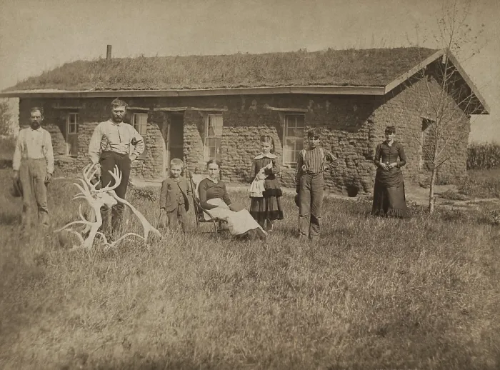 Framed Print : Morrison family residence on Victoria Creek near Merna, Custer County, Nebraska, 1886. Four adults and three children pose in front of their sod house. Photo by Solomon D