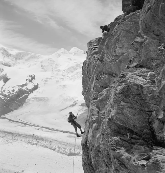 Framed Print : Two mountain climbers on the side of a mountain in Zermatt, Switzerland. 1954 photo by Toni Frissell