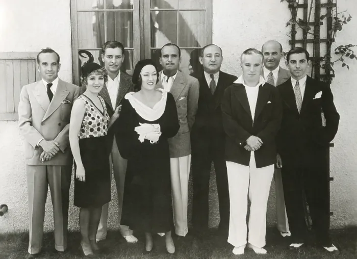 Framed Print : Movie stars and executives of United Artist Corporation. Ca. Nov. 10, 1930. L-R: Al Jolson, Mary Pickford, Ronald Colman, Gloria Swanson, Douglas Fairbanks, Joseph Schenok (Pres) Framed Print : Movie stars and executives of United Artist Corporation. Ca. Nov. 10, 1930. L-R: Al Jolson, Mary Pickford, Ronald Colman, Gloria Swanson, Douglas Fairbanks, Joseph Schenok (Pres)