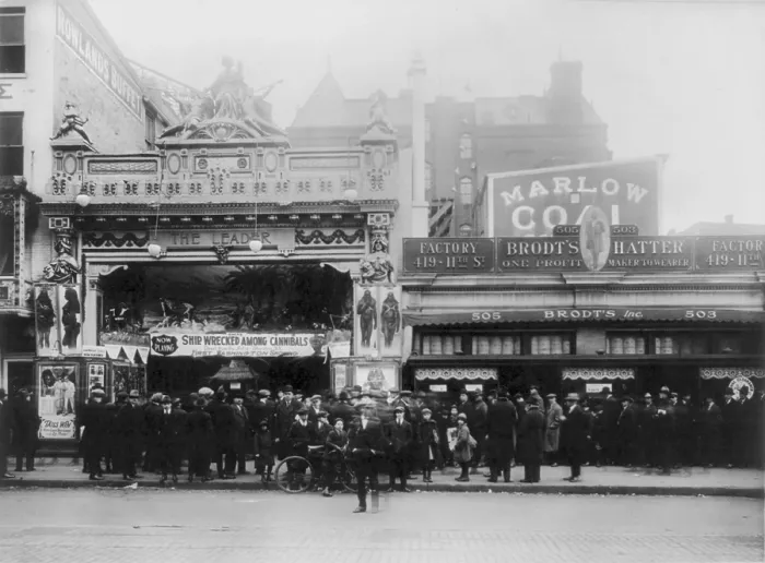 Framed Print : Movie theaters, Lust's Leader Theater, showing SHIPWRECKED AMONG CANNIBALS, Washington DC. photograph 1920