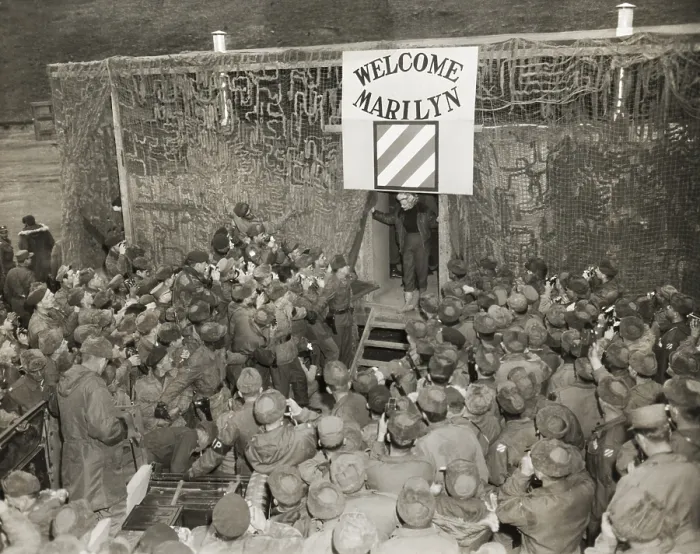 Framed Print : MPs hold back soldiers eager to see and take pictures of Marilyn Monroe. She performed ten shows in four days for U.S. Troops in Korea. Ca. Feb. 18-22, 1954. (BSLOC_2014_13_206) Framed Print : MPs hold back soldiers eager to see and take pictures of Marilyn Monroe. She performed ten shows in four days for U.S. Troops in Korea. Ca. Feb. 18-22, 1954. (BSLOC_2014_13_206)