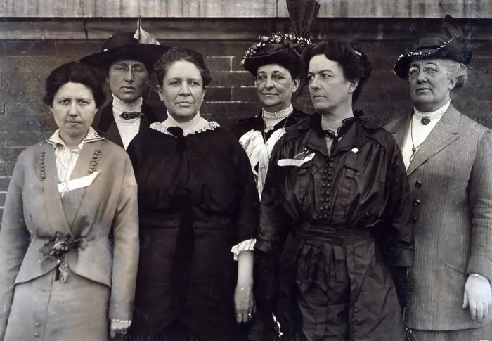 Framed Print : Mrs. Florence Kelley, Chief State Factory Inspector of Illinois, 1893-97 (3rd from left), surrounded by other factory inspectors. Lewis Hine Wickes photograph, March 1914