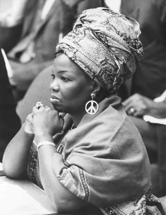 Framed Print : Mrs. Jeanne Martin Cisse, wears peace symbol earrings at the U.N. Security Council. Nov. 16, 1972