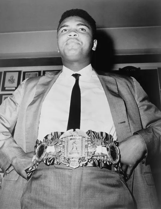 Framed Print : Muhammad Ali (b. 1942), displays the 24-carat gold-plated heavyweight championship belt on Sept. 18 1964. He won the belt on Feb 25, 1964, after his victory over Sonny Liston Framed Print : Muhammad Ali (b. 1942), displays the 24-carat gold-plated heavyweight championship belt on Sept. 18 1964. He won the belt on Feb 25, 1964, after his victory over Sonny Liston