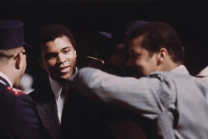 Framed Print : Muhammad Ali talks with fellow Black Muslims in Chicago March 1974