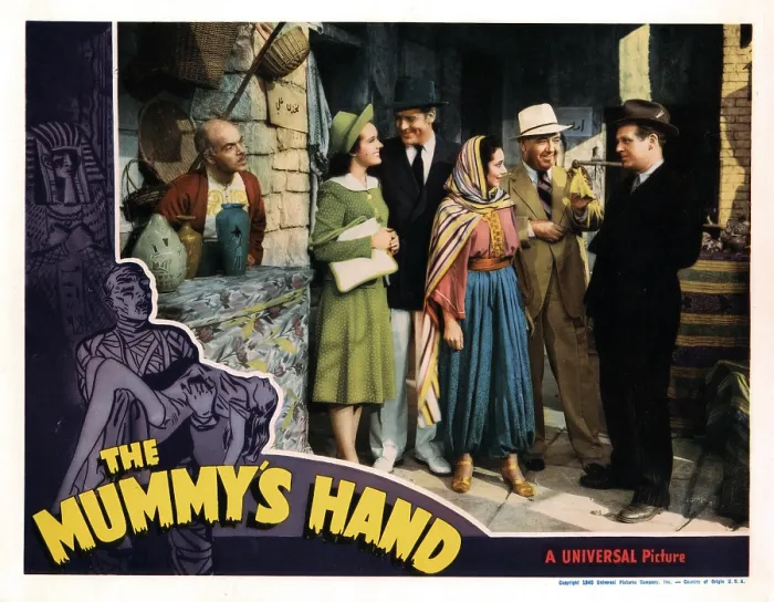 Framed Print : THE MUMMY'S HAND, from left, Michael Mark, Peggy Moran, Dick Foran, Mara Tartar, Cecil Kellaway, Wallace Ford, 1940