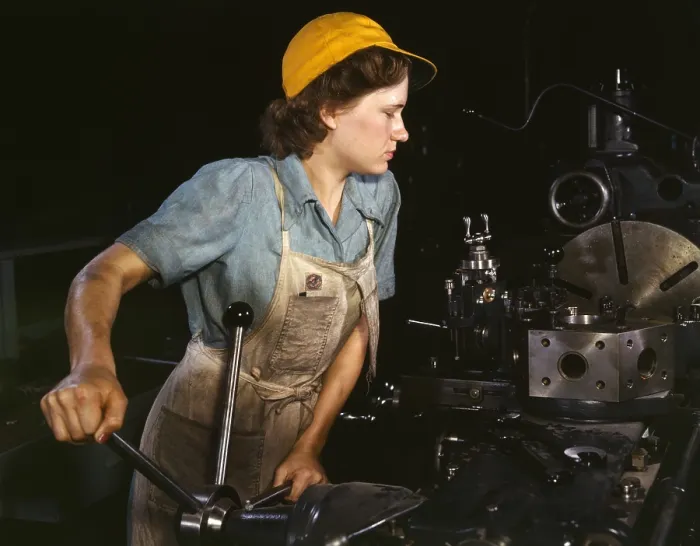 Framed Print : Muscular woman lathe operator machining aircraft parts during World War 2. Consolidated Aircraft Corporation plant, Fort Worth, Texas. Oct. 1942. (BSLOC_2013_14_142)