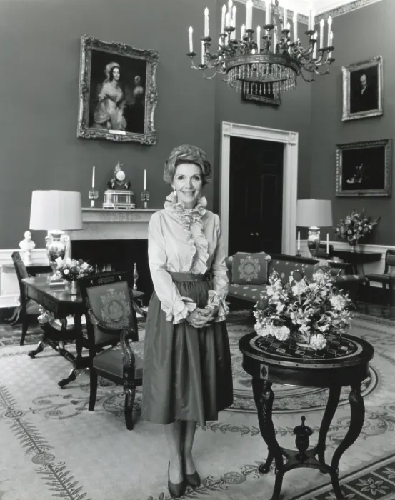 Framed Print : Nancy Reagan poses in the White House Red Room for her official first term portrait. February 7, 1981 (BSLOC_2021_3_23)