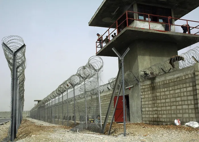 Framed Print : Nasiriyah Prison under construction during the US and Coalition occupation of Iraq. The maximum security prison will hold up to 800 inmates. Aug. 14 2005. (BSLOC_2011_12_164)