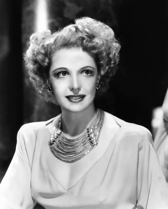 Framed Print : Natalie Schafer, modeling a necklace made of beige fringe and gold beads, 1944 Framed Print : Natalie Schafer, modeling a necklace made of beige fringe and gold beads, 1944