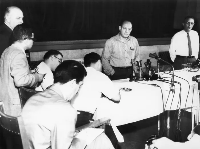 Framed Print : Nathan Leopold, 52 year old, speaks to the press at Statesville Penitentiary, July 31, 1957. The famous murderer had just been refused executive clemency by Gov. William Stratton