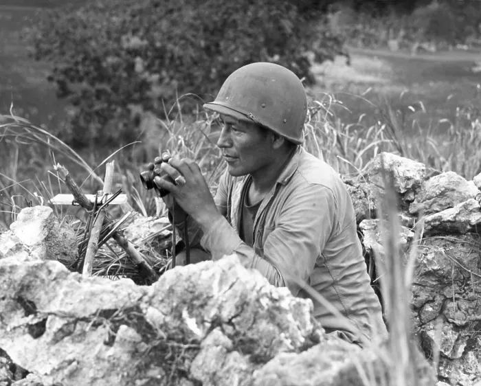 Framed Print : Native American Marine Code Talker at an observation post overlooking the city of Garapan. During the Battle of Saipan. June 27, 1944, World War 2. (BSLOC_2013_14_61)