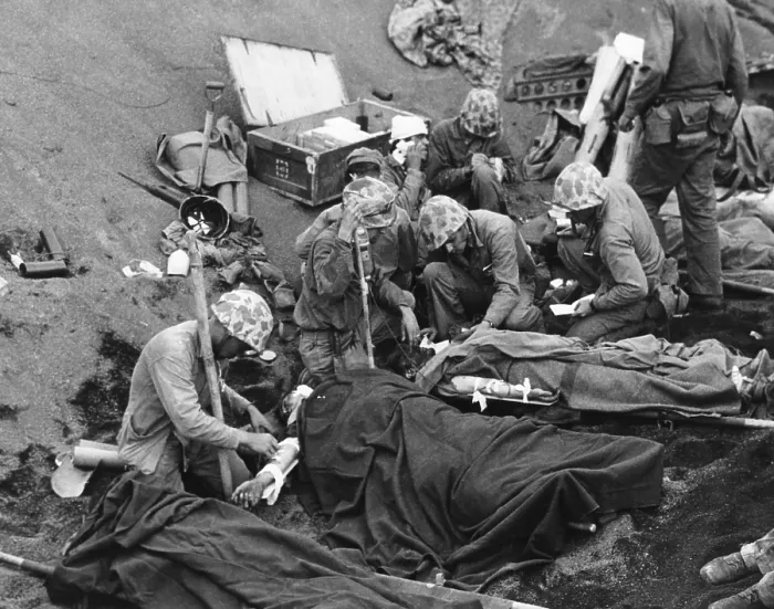 Framed Print : Navy doctors and corpsmen treat seriously wounded Marines on Iwo Jima. Feb. 19-March 26, 1945, during World War 2. (BSLOC_2013_14_255)