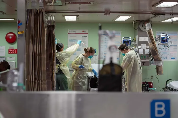 Framed Print : Navy hospital ship USNS Mercy sailors treat a patient from a Los Angeles medical facility, on March 29, 2020 Framed Print : Navy hospital ship USNS Mercy sailors treat a patient from a Los Angeles medical facility, on March 29, 2020