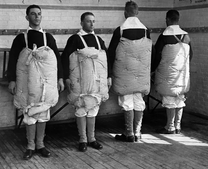 Framed Print : Navy recruits with their mattresses tied to them to serve as life preservers. Newport Naval Training Station, Rhode Island. World War I. April 1917 Framed Print : Navy recruits with their mattresses tied to them to serve as life preservers. Newport Naval Training Station, Rhode Island. World War I. April 1917