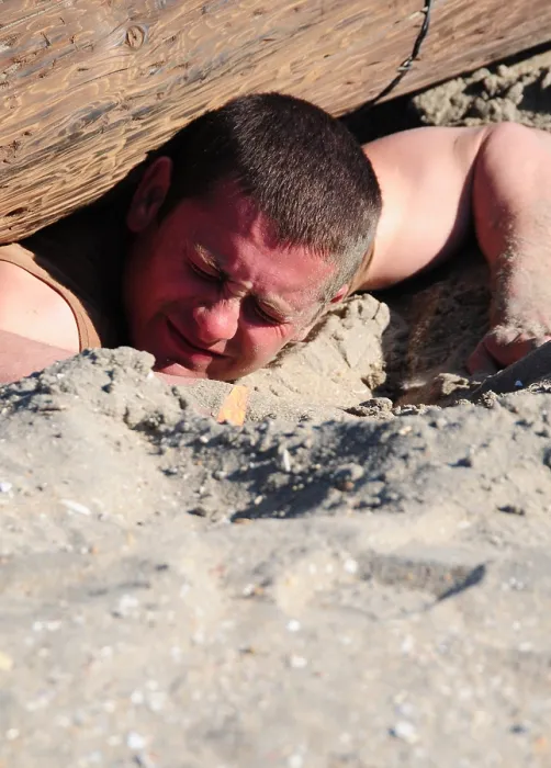 Framed Print : US Navy sailor digs under a wood and barbed wire obstacle on the Naval Special Warfare obstacle course. March 2 2011. (BSLOC_2011_12_265) Framed Print : US Navy sailor digs under a wood and barbed wire obstacle on the Naval Special Warfare obstacle course. March 2 2011. (BSLOC_2011_12_265)