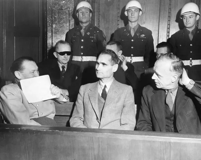 Framed Print : Nazi defendants under guard in the dock at Nuremberg War Crimes Trial, Feb. 5, 1946. L-R: Herman Goering covers his grin with a piece of paper; Adm Framed Print : Nazi defendants under guard in the dock at Nuremberg War Crimes Trial, Feb. 5, 1946. L-R: Herman Goering covers his grin with a piece of paper; Adm