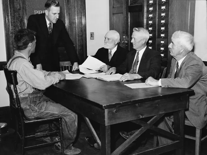 Framed Print : A Nebraska farmer meets with a Farm Security Administration Debt Adjustment Committee for help to avoiding foreclosure of his farm mortgage Framed Print : A Nebraska farmer meets with a Farm Security Administration Debt Adjustment Committee for help to avoiding foreclosure of his farm mortgage