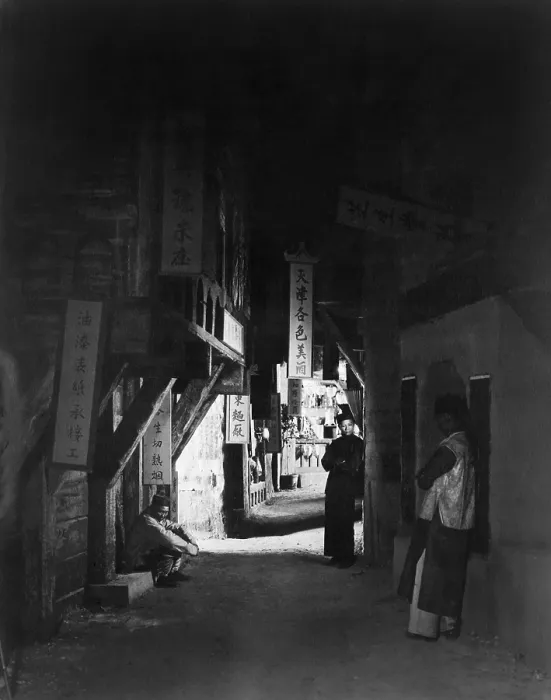 Framed Print : Neighbors of the Alley, by Paul Grenbeaux. Three Chinese men in a dark alley of Chinatown, in Los Angeles, California, c. 1922 (BSLOC_2016_8_83) Framed Print : Neighbors of the Alley, by Paul Grenbeaux. Three Chinese men in a dark alley of Chinatown, in Los Angeles, California, c. 1922 (BSLOC_2016_8_83)