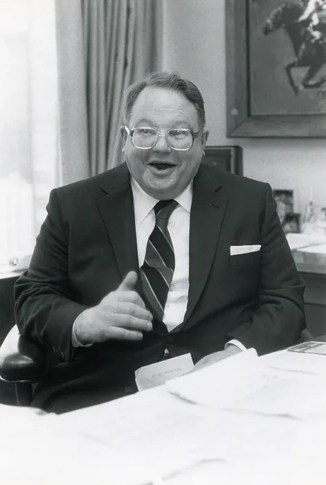 Framed Print : Nelson Bunker Hunt, son of oil tycoon H. L. Hunt, ca. 1980 in his office decorated with paintings of thoroughbred race horses. His horse, Empery, won the British Derby in 1976
