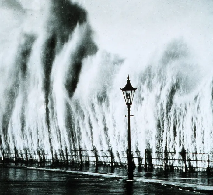 Framed Print : New England Hurricane. Waves striking a seawall on th New England coast give the appearance of geysers erupting. September 1938
