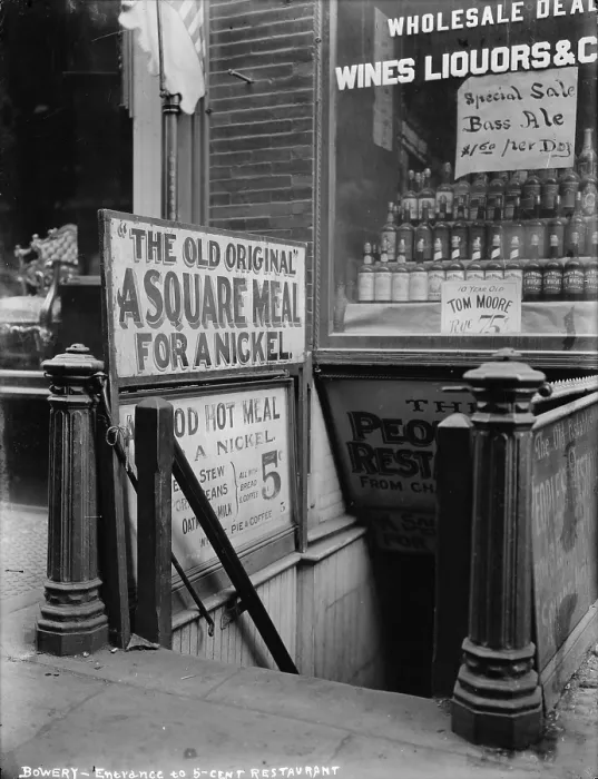 Framed Print : New York City, the Bowery, entrance to a five cent restaurant, photograph, circa 1910s-1920s