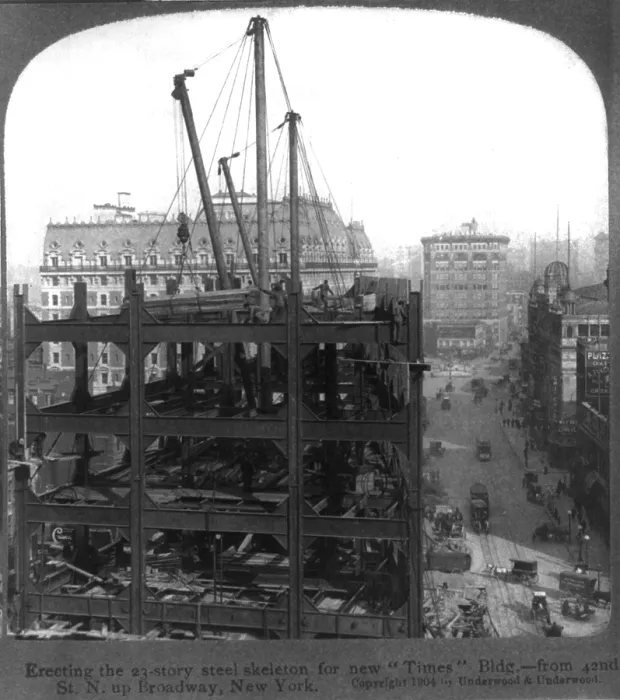 Framed Print : New York City, erecting the 23 story steel skeleton for the Times Building from 42nd Street North up Broadway, New York, photograph, 1904