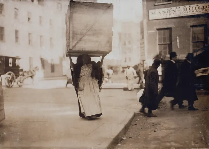 Framed Print : New York City, Italian woman carrying an enormous empty dry-goods box for along Bleeker Street, photograph by Lewis Wickes Hine, February, 1912
