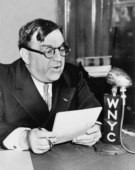 Framed Print : New York City, Mayor Fiorello La Guardia (1882-1947), speaks over WNYC on grade A milk from budget room, photograph by Fred Palumbo, March 23, 1940