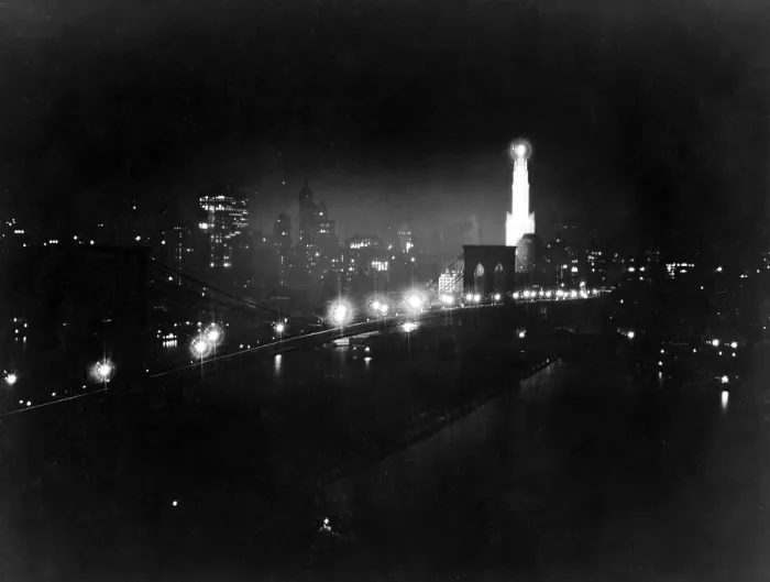 Framed Print : New York City. Night view of New York by Sperry searchlight, skyline from East River. Photograph, March 31, 1919