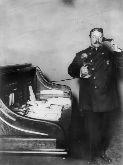 Framed Print : New York City, police department activities, Inspector McCafferty, on telephone, photograph, 1908 Framed Print : New York City, police department activities, Inspector McCafferty, on telephone, photograph, 1908