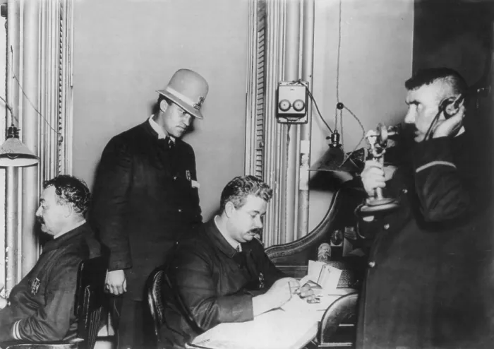 Framed Print : New York City, police department activities, Information Bureau at head-quarters, four men at work, photograph, 1908