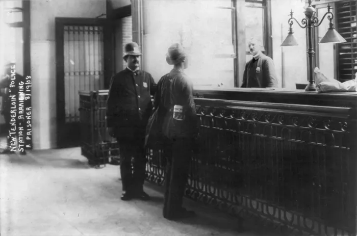 Framed Print : New York City, police department activities, arraigning prisoner at Tenderloin station, photograph, 1908