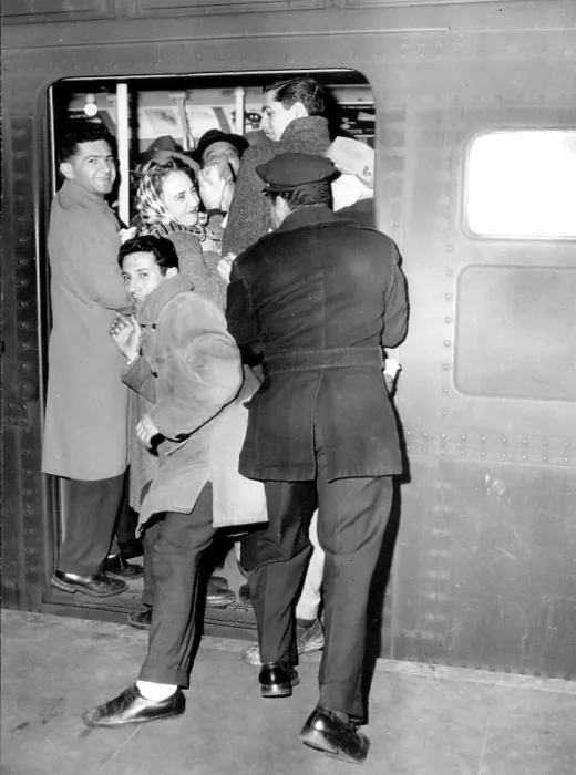 Framed Print : New York City Subways - Crowds jam onto subway trains 12 / 1957. Courtesy: CSU Archives  /  Everett Collection
