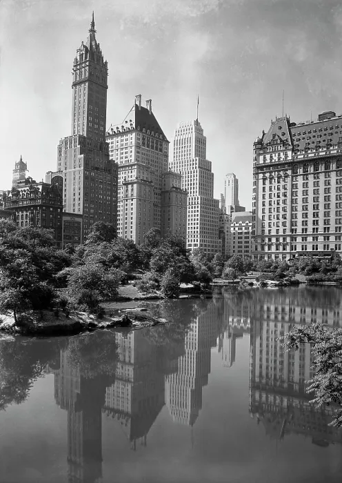 Framed Print : New York City, view of plaza buildings over park lake, photograph by Samuel H. Gottscho, January 23, 1933