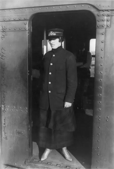 Framed Print : New York City, woman subway worker standing in subway doorway, New York, photograph, 1917