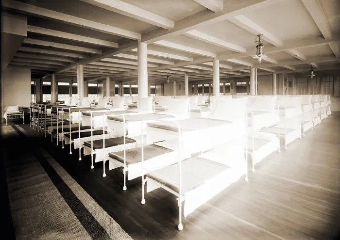 Framed Print : New York City's Municipal Lodging House men's dormitory with rows of bunk beds. The shelter provided 800 iron bunks for men on three floors. 1910
