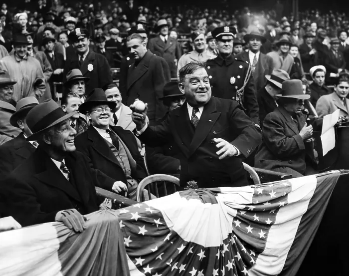 Framed Print : New York Mayor Fiorello LaGuardia (foreground center), throwing the first ball of the 1943 baseball season into the field, Yankee Stadium, New York, April 22, 1943