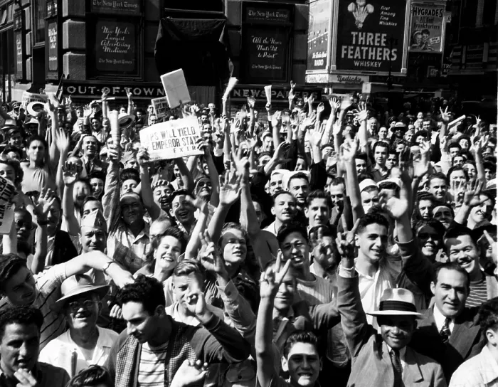 Framed Print : New Yorkers celebrating VJ Day and the prospect of an end to World War II, Times Square. The newspaper headline reads: Japs Will Yield If Emperor Stays, August 1945 Framed Print : New Yorkers celebrating VJ Day and the prospect of an end to World War II, Times Square. The newspaper headline reads: Japs Will Yield If Emperor Stays, August 1945