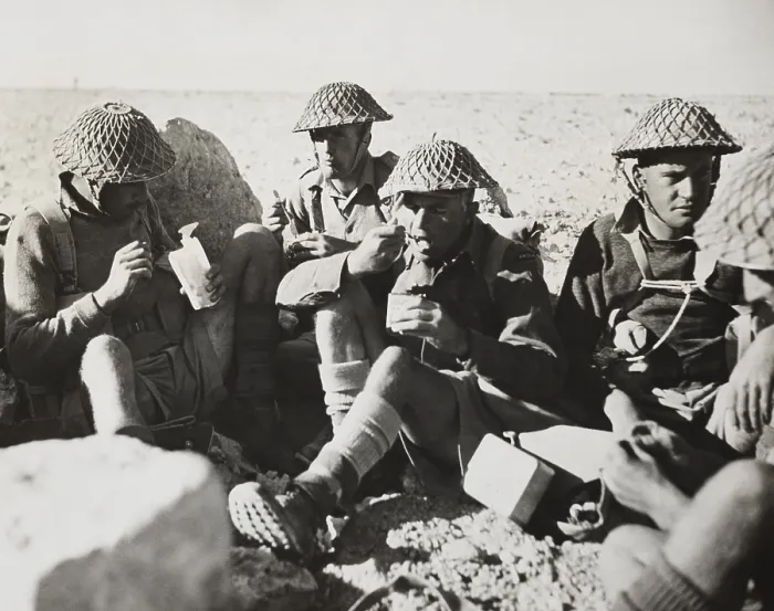 Framed Print : New Zealanders in Libya eat lunch during World War 2. In center, spoon-to-mouth, is 2nd Lt. Charles Kazlett Upham, awarded the Victoria Cross during the fighting in Crete. Ca Framed Print : New Zealanders in Libya eat lunch during World War 2. In center, spoon-to-mouth, is 2nd Lt. Charles Kazlett Upham, awarded the Victoria Cross during the fighting in Crete. Ca