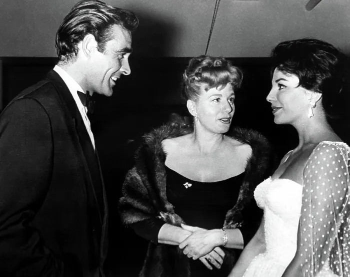 Framed Print : Newcomer SEAN CONNERY, chats with SHELLEY WINTERS and JOAN COLLINS at the Hollywood premiere party for THE VIKINGS, 1958 Framed Print : Newcomer SEAN CONNERY, chats with SHELLEY WINTERS and JOAN COLLINS at the Hollywood premiere party for THE VIKINGS, 1958
